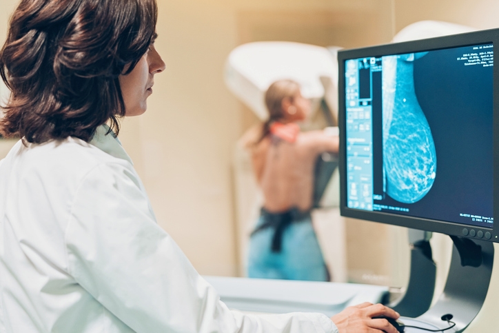 Doctor and patient taking a mammography