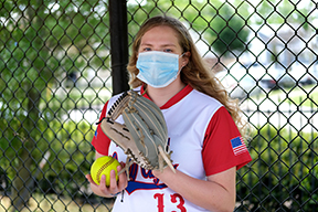 Teenage Girl with Softball Uniform and Healthcare Masks